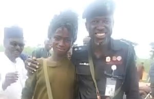 Shock as Security Officer Snaps Photo With Armed Bandit — Nigerians Raise Alarm Over Possible Compromise